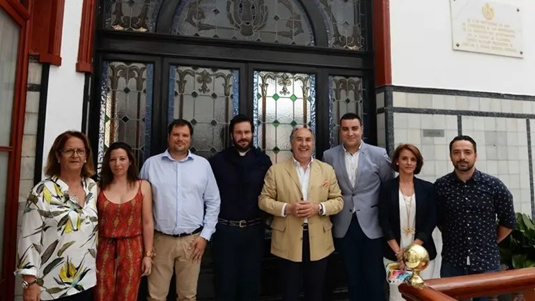 REUNION CON EL CURA DE LAS COLINAS