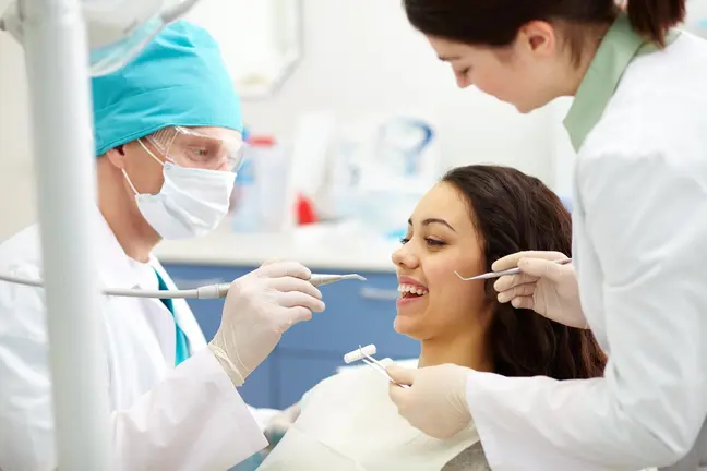Pretty patient during dental check-up in clinic