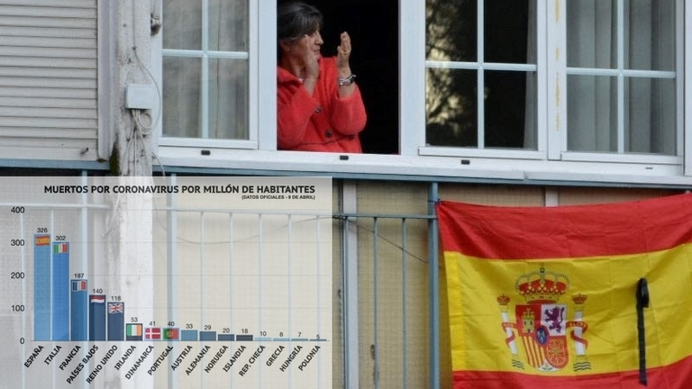 Una-bandera-espanola-con-crespon-negro-en-un-balcon