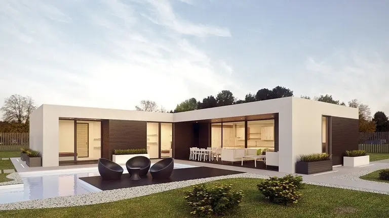 Una casa con jardin y piscina