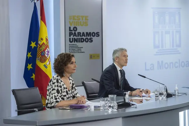 La ministra portavoz y ministra de Hacienda, Mar&iacute;a Jes&uacute;s Montero, y el ministro del Interior, Fernando Grande-Marlaska, comparecen en rueda de prensa - EUROPA PRESS
