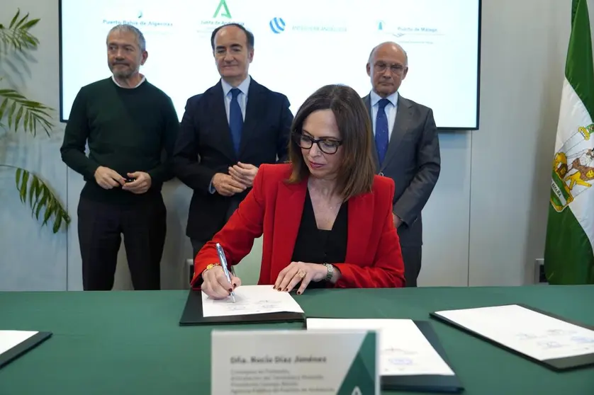 Firma de la consejera